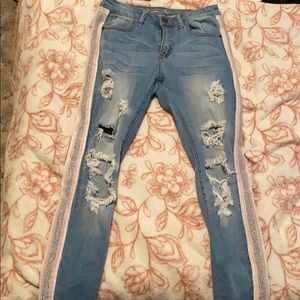 ripped jeans w/ pink detail